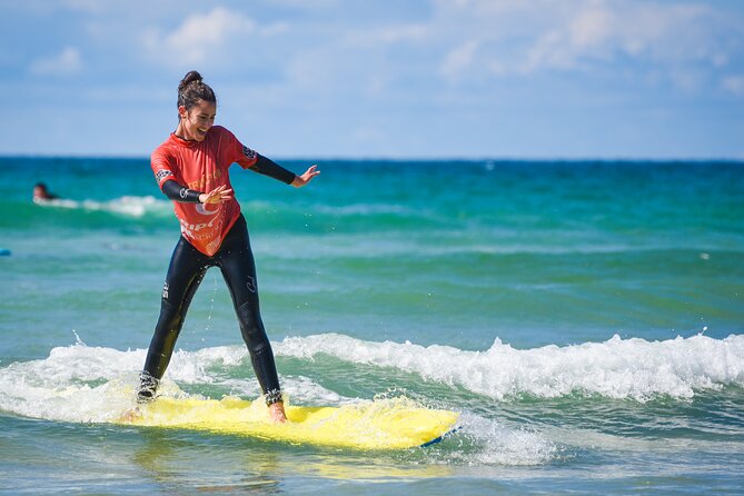 Beginner Surf Lesson in Newquay, Cornwall - Using a stable Swell foam board