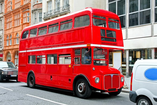 Buckingham Palace and Vintage Bus Tour of London - The 30-minute Thames cruise from the Tower