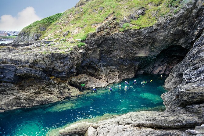 Coasteering Experience in Newquay - Traversing rock with the instructors