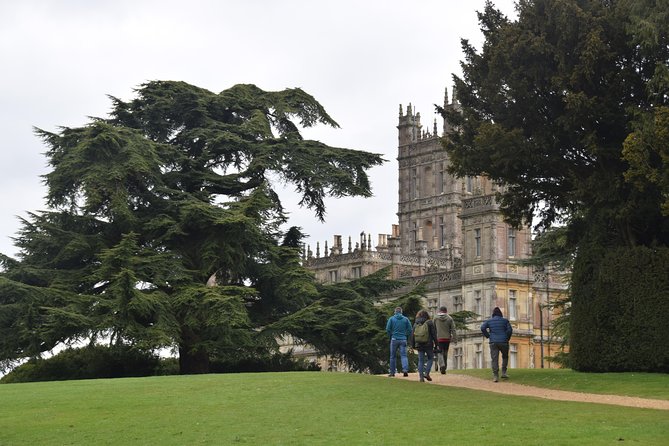Downton Abbey and Village Coach Tour from London with Highclere - Entering Highclere Castle after the television fame