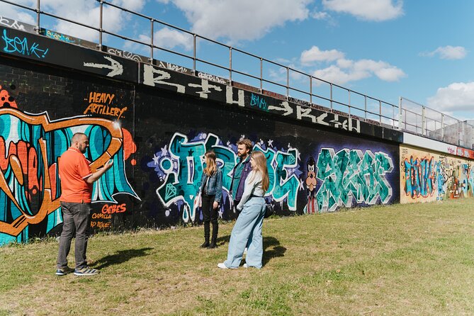 East End London Instagrammable Street Art and Graffiti Tour - Ebor Street shifts from rough walls to polished style