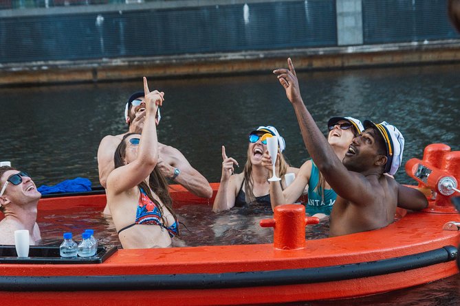 Hot Tub Boat Tour in London - London's most unique tour - West India Docks: London’s Working Waterfront