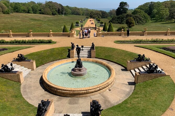 Isle of Wight Guided Day Tour from London - Godshill brings cottages, church bells, and garlic chocolate