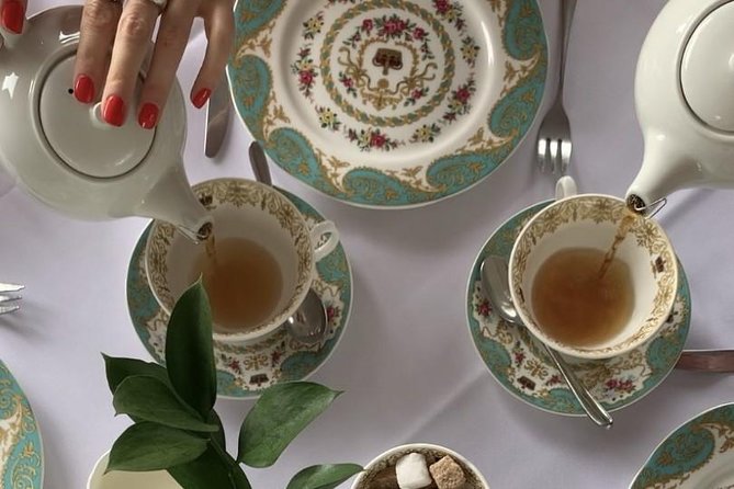 Kensington Palace VIP Garden Tour with Royal High Tea - Diana’s statue and the Sunken Garden view