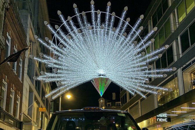London Bespoke Black Cab Christmas Lights & Sights Private Tour - Leicester Square brings lights, films, and city energy