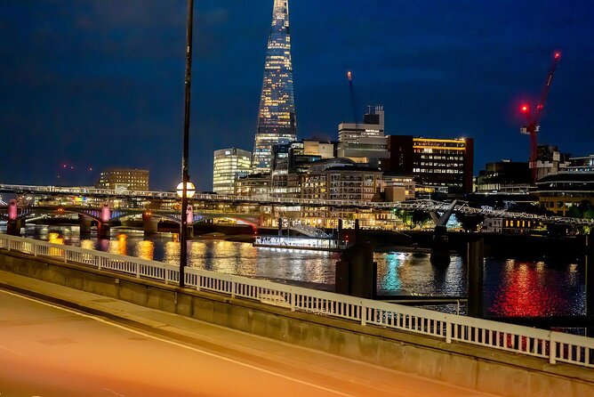 London Night Tour See the City Lights - Westminster Abbey and Parliament glow beside the Thames
