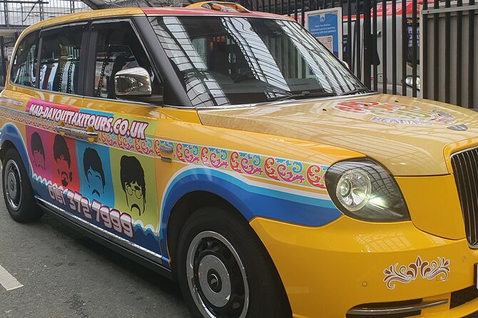 Mad Day Out Beatles Taxi Tours in Liverpool, England - Penny Lane beyond the street sign