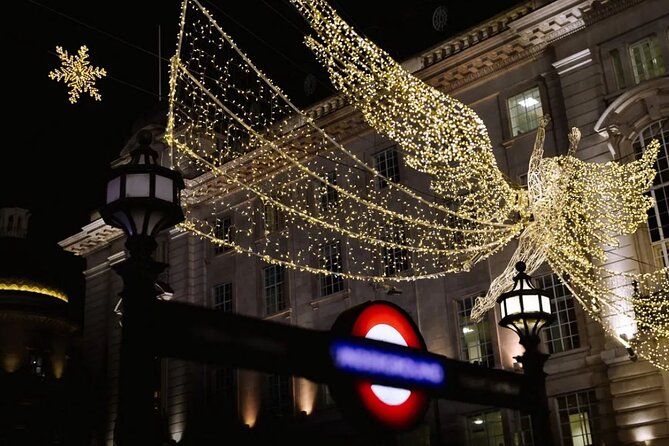 Magical London Christmas Lights Walking Tour with a Londoner - Piccadilly Circus brings the city’s electric side