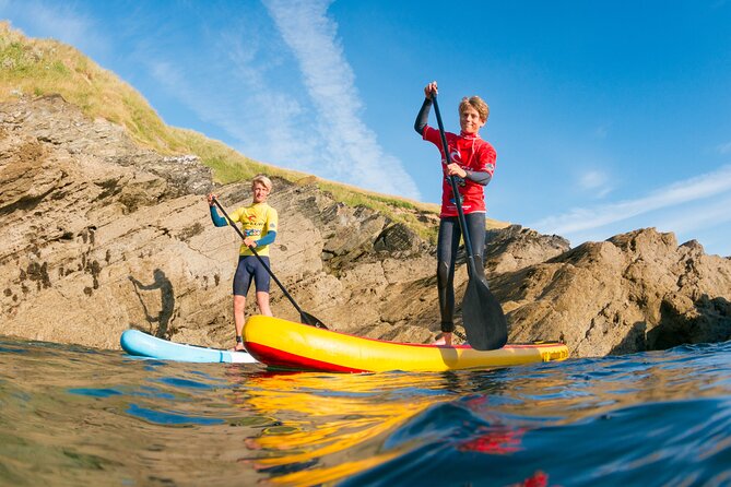 Paddleboarding Around Newquay's Coastline - Launching From A Sheltered Section Of Coast