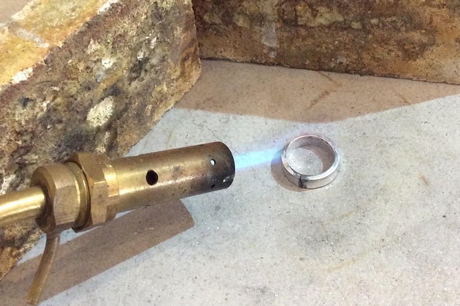 Silver Ring Workshop in Kent, England - Using the torch, with Annie close by
